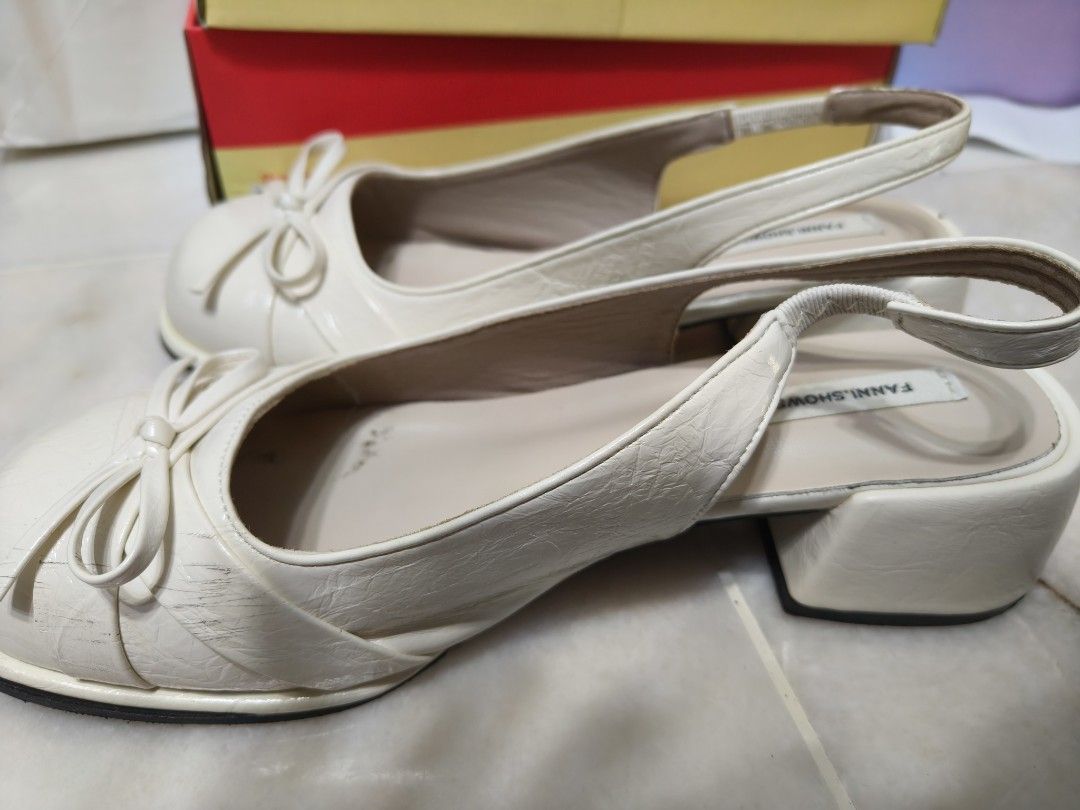 Covered Slingback bow Heels Cream color Size 25.0/40 (Category: Heels) located in Petaling Jaya. Submitted by happieedayy (Listing ID 1451425607, Image 2). Description: - Cream slingback heels from FANILSHOWS - Adorable bow detail on the front - Elastic strap at the back for a secure and comfortable fit - Size: 25.0 /40 - Versatile for casual outings or semi-formal events -reason for selling: size too big for me.