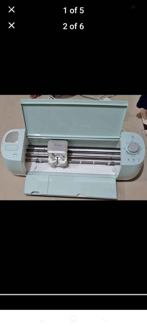 Cricut Explore Air 2 Cutting Machine with Accessories (Category: Craft Supplies & Tools) located in Makati City. Submitted by jhuvskie (Listing ID 1451371994, Image 1). Description: - Cricut Explore Air 2 machine - Includes various accessories: vinyl sheets, transfer tape, crafting tools - Ideal for DIY projects, custom decals, personalized gifts, and more - Machine is in good working order - Bundle includes all items shown in the photos.