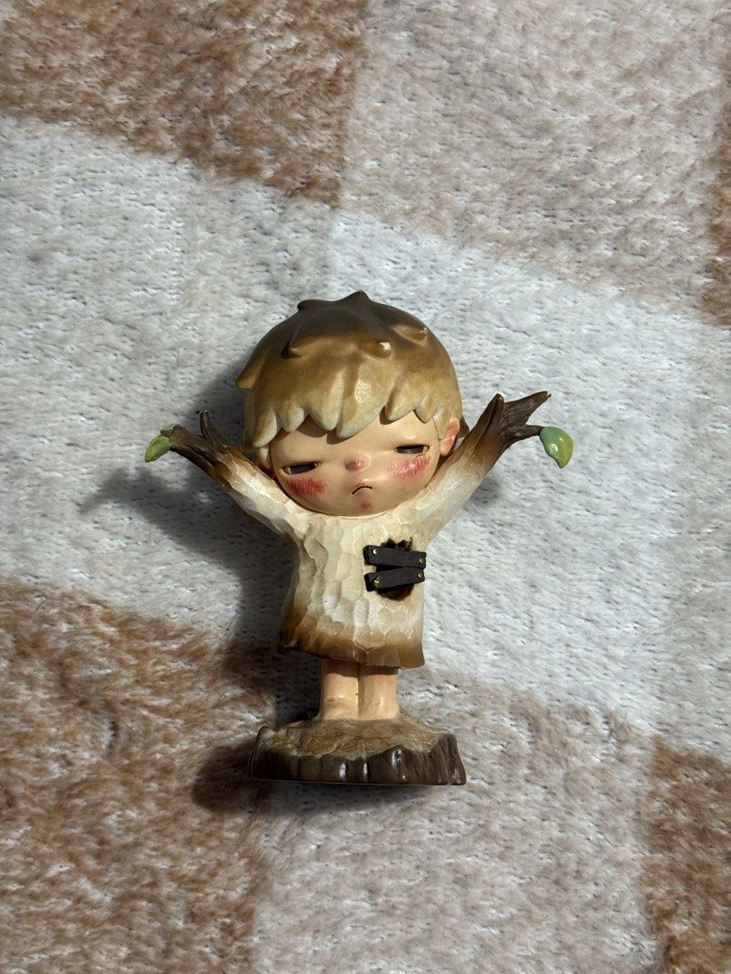 Cute Blind Box Figurines - Set of 3 (Category: Designer & Blind Box Toys) located in Manila. Submitted by caphjipano68561 (Listing ID 1451452315, Image 2). Description: - Set of 3 unique collectible figurines. - Figurine 1: Sitting on a stump, playing an instrument. - Figurine 2: Adorable tree creature design. - Figurine 3: Student reading a book with books stacked on its head. - Great for display and adding charm to any space..