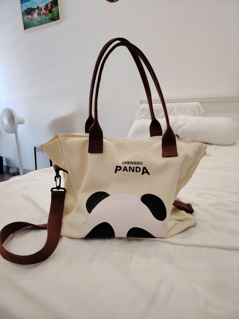 Cute Panda Tote Bag (Category: Tote Bags) located in Kuala Lumpur. Submitted by ladidadida73125 (Listing ID 1451427166, Image 2). Description: first pic colour is more like the actual product. the bag cloth material is soft and textured,very nice to touch thick material the bag has structure, can stand on its own, more sturdy and practical I bought this bag while travelling, ori price is like 40 ish got minor stain,but overall pretty new can pm m
