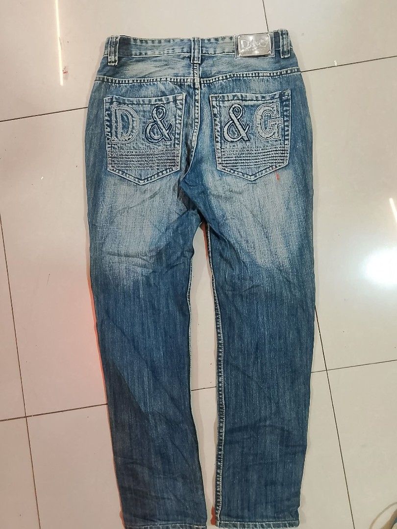 D&G Dolce & Gabbana Distressed Denim Jeans (Category: Jeans) located in Ozamiz City. Submitted by dg0816 (Listing ID 1451339478, Image 2). Description: - Authentic D&G Dolce & Gabbana jeans - Classic blue denim with distressed wash - Features iconic DG logo on front and back pockets - Button and zip closure - Ideal for a casual look.