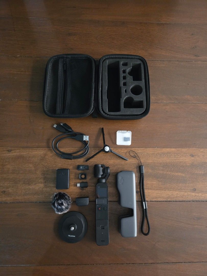 DJI Pocket 2 Creator Combo (ready to shoot) (Category: Cameras) located in General Trias. Submitted by caramelliee (Listing ID 1451362093, Image 1). Description: 100% working condition, no issues. Can send proof gimbal is working. Inclusions: - DJI Pocket 2 gimbal camera with do-it-all handle (attached to the unit) - protective case - wrist strap - mini control stick - wide angle lens - usb c smartphone adapter - wireless microphone transmitter -