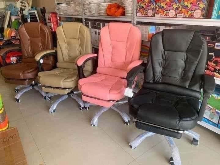 Ergonomic Office Chair with Footrest - Multiple Colors Available (Category: Office Furniture & Fixtures) located in Caloocan City. Submitted by swiftflower_802790 (Listing ID 1451384254, Image 1). Description: - Comfortable office chairs for sale - Available colors: Brown, Beige, Pink, Black - Padded seat and backrest for maximum comfort - Adjustable armrests for personalized support - Smooth-rolling base for easy mobility - Some chairs include a