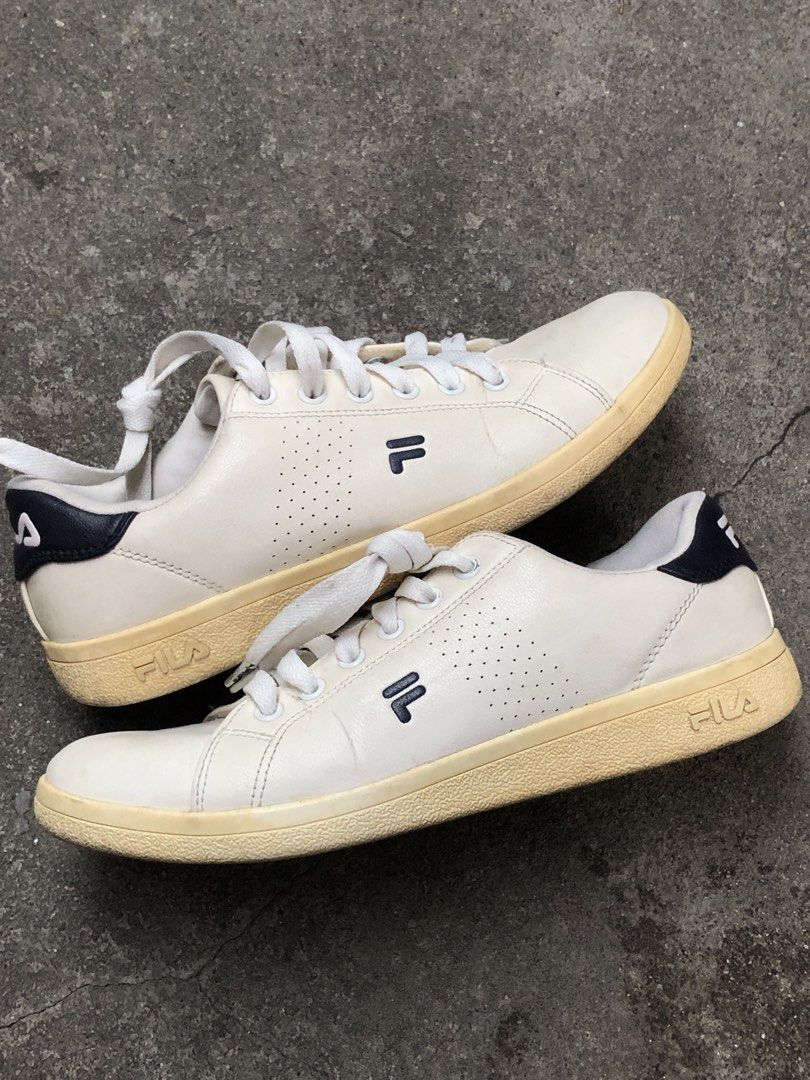 FILA Crosscourt 2 Low “White Navy” (Category: Sneakers) located in Manila. Submitted by ev.bgrn9 (Listing ID 1451443371, Image 2). Description: Size 7 | 8/10 condition | creased, yellowing mid sole, minimal heel drag (unnoticeable) •gifted to me •needs cleaning •super duper minimal heel drag thag unnoticeable •yellowing due to not wearing it and aged midsole that looks perfectly fine! •super good condition! fine a shoe!.