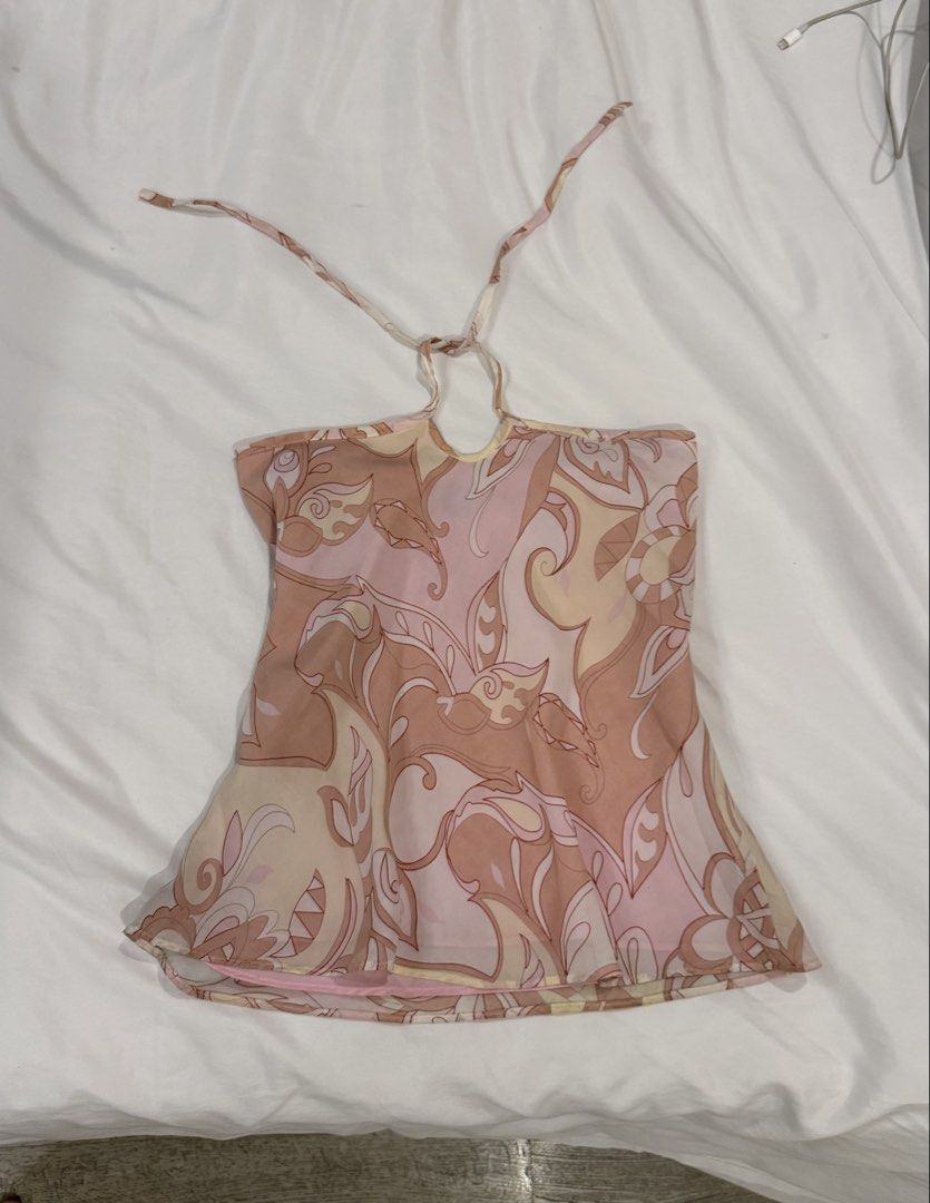Flowy Floral Print Halter Neck (Category: Sleeveless) located in Quezon City. Submitted by gogoop (Listing ID 1451436373, Image 1). Description: - Cute halter neck top from FORME - Size is large but is pretty small imo, can fit s-m MOP: Gcash Delivery: Grab/Lalamove.