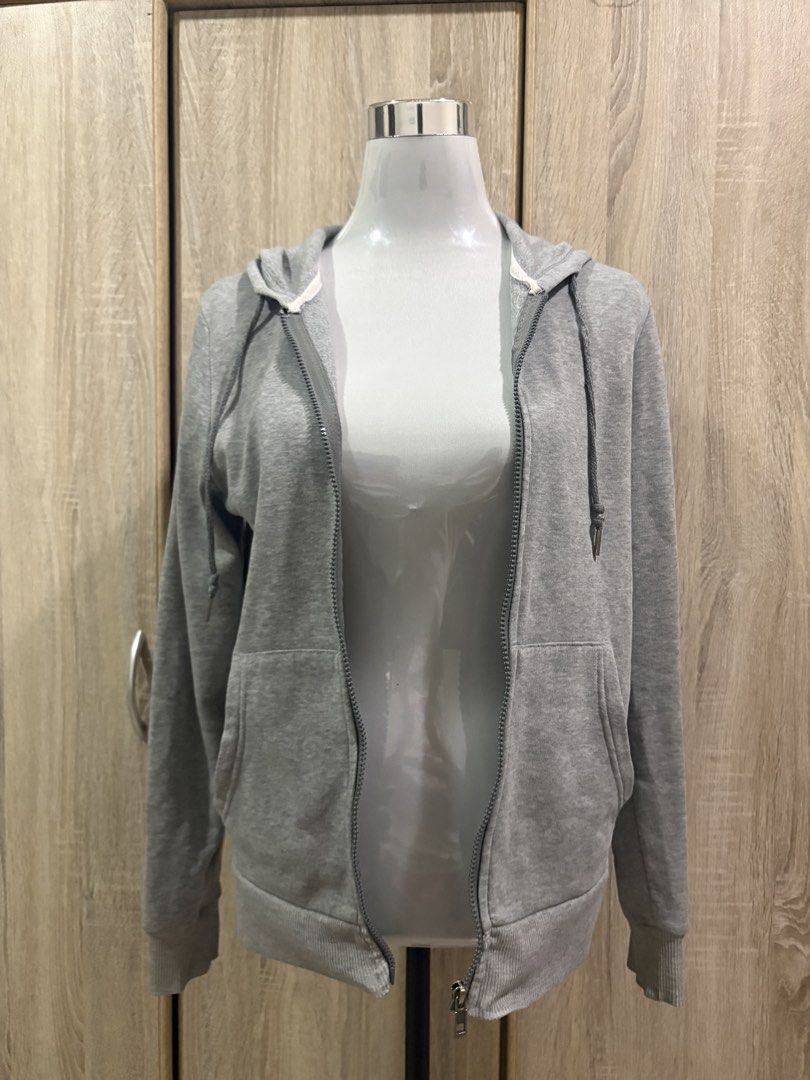 Folded&Hung Grey Zip-Up Hoodie Size S (Category: Coats, Jackets and Outerwear) located in Manila. Submitted by roseannn_ (Listing ID 1451452645, Image 2). Description: - Brand: Folded&Hung - Color: Grey - Type: Zip-up Hoodie - Size: S - Features: Hood, Pockets - Style: Casual, easy to pair.