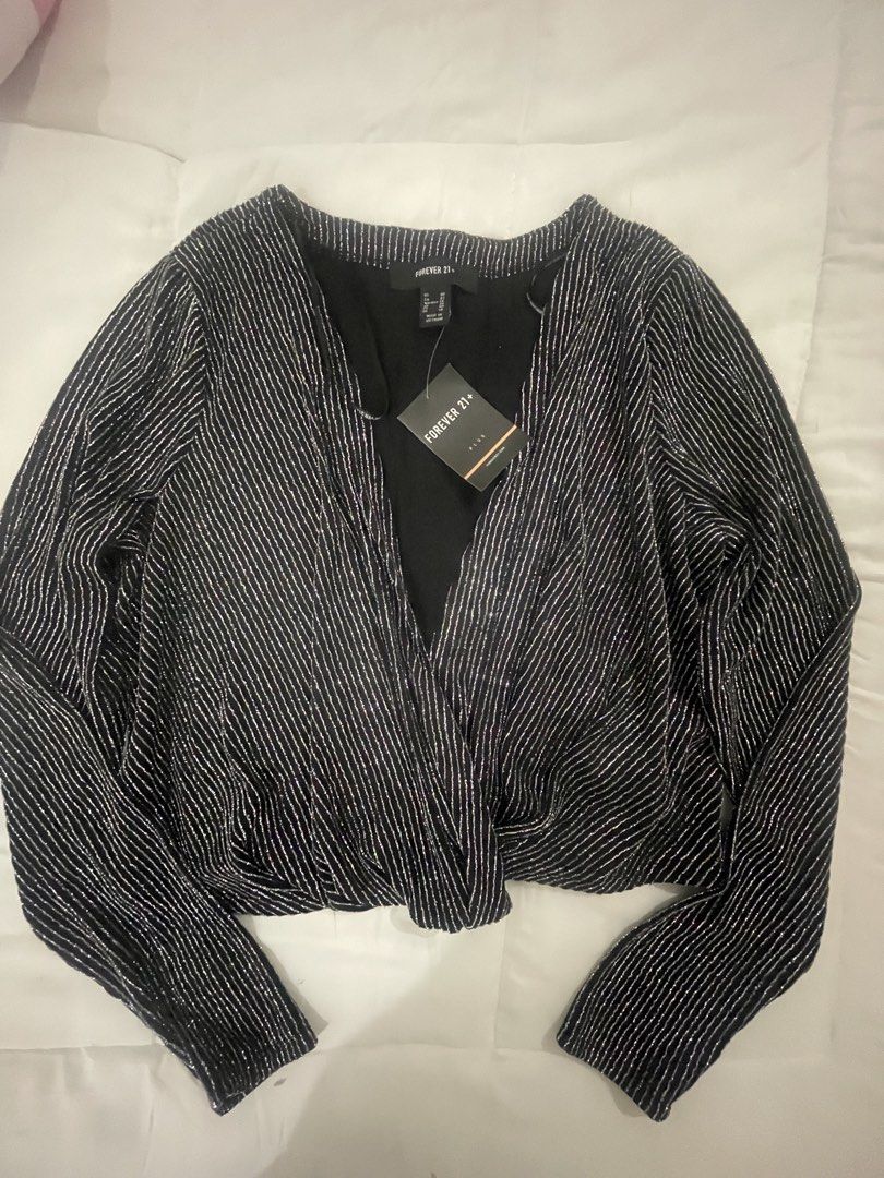 Forever21 plus size blouse (Category: Announcements) located in Las Pinas. Submitted by silvader (Listing ID 1451430955, Image 1). Description: Bnwt Xl Shiny lomgsleeved top.
