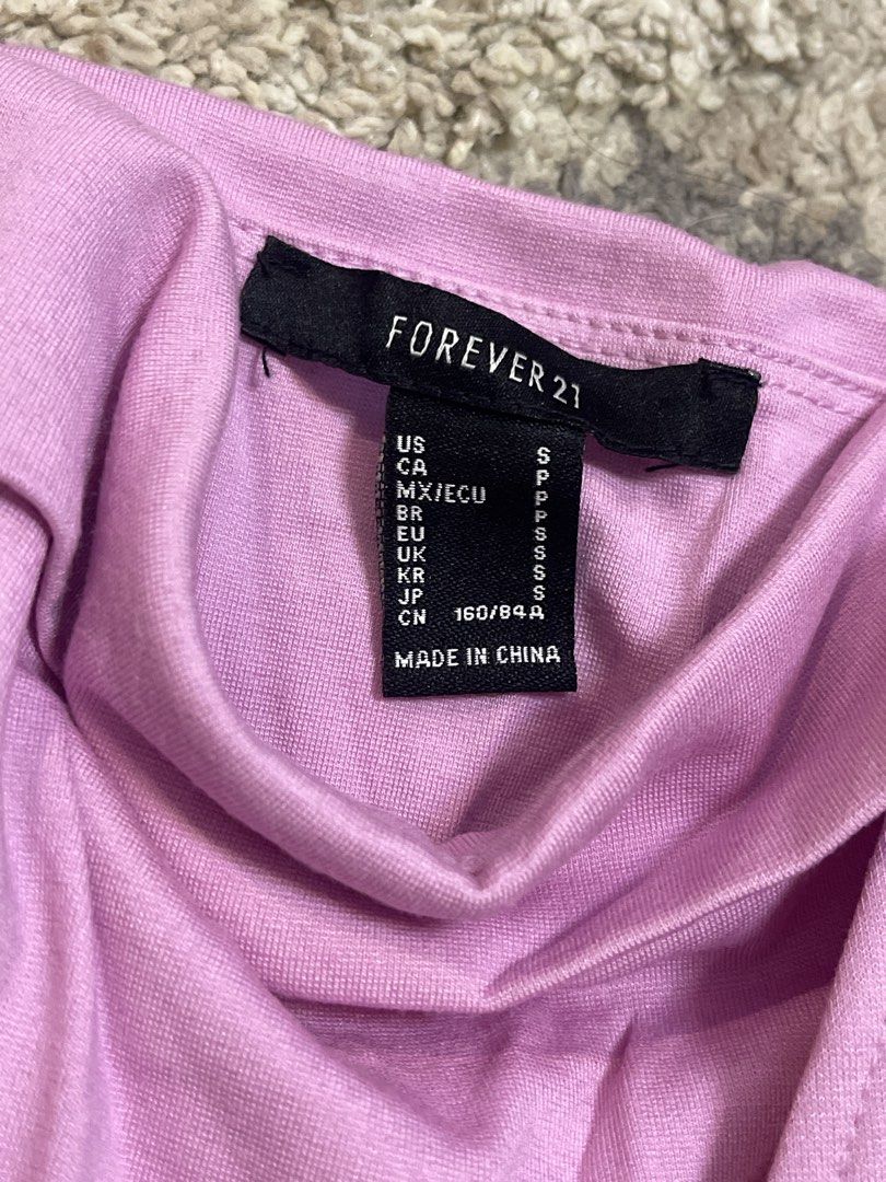 Forever 21 Pink Corset Top Size S (Category: Others Tops) located in Marikina City. Submitted by bimbems (Listing ID 1451455161, Image 2). Description: - Pink corset top - Brand: Forever 21 - Size: S - Features boning for structure - Adjustable straps - Versatile: pairs well with jeans or skirts - Ideal for going out Worn once ONLY RFS: decluttering Loc 📍: Marikina City Jnt Delivery.