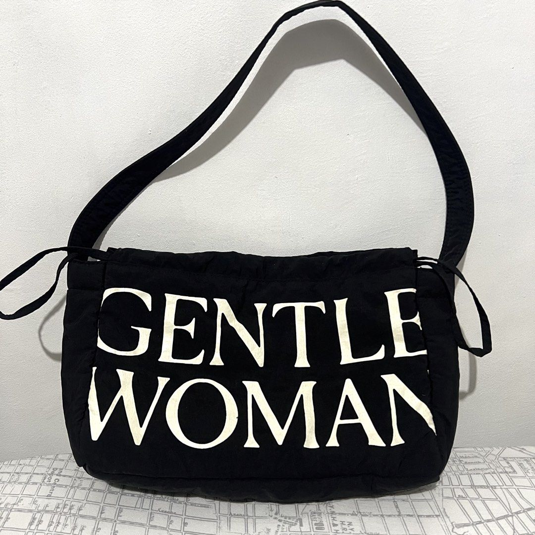 RUSH‼️ GENTLE WOMAN Black Dumpling Bag (Category: Tote Bags) located in Makati City. Submitted by b5closet (Listing ID 1451412893, Image 1). Description: - Gentle Woman Black Dumpling Bag - Magnetic snap closure with drawstring - Nylon-like material - Gentle Woman tag inside the bag - Original bought in Gentle Woman store Thailand NOTE: - Condition: Minimal yellowing on the Gentle Woman print but still in great condition ‼️ - GCASH and BDO MOP - 
