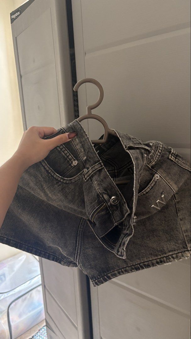 Grey Denim Shorts (Category: Shorts) located in Manila. Submitted by declutterbybeans (Listing ID 1451363015, Image 1). Description: - Grey denim shorts - Button and zip closure - Front and back pockets - Slightly faded wash - Estimated size: Small - Ideal for casual outfits.