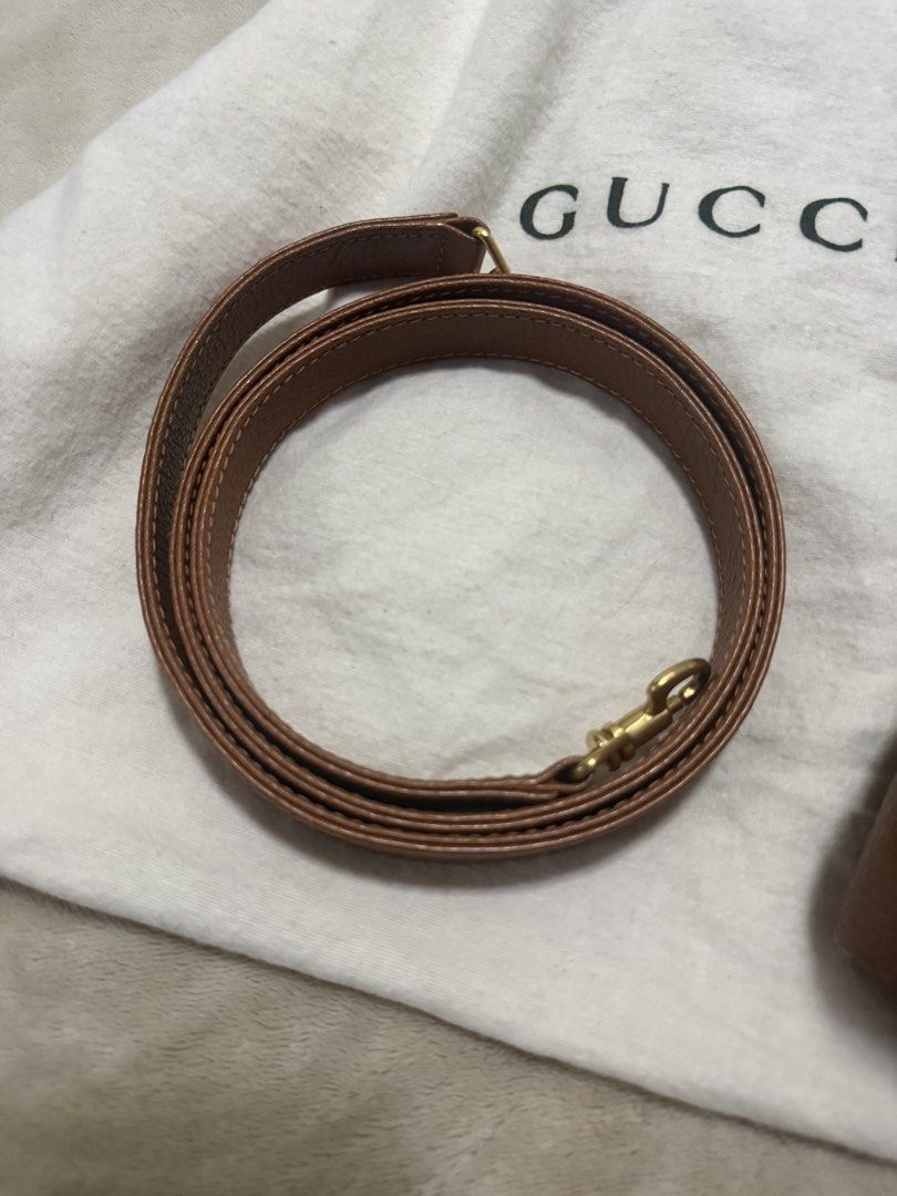Gucci Bamboo Top Handle Bag Brown Leather (Category: Luxury Bags & Wallets) located in Muntinlupa City. Submitted by marthapee (Listing ID 1451427573, Image 3). Description: - Authentic brown leather Gucci handbag - Iconic bamboo closure - Detachable shoulder strap included - Original dust bag included - Versatile for day or night use - A timeless addition to your collection.