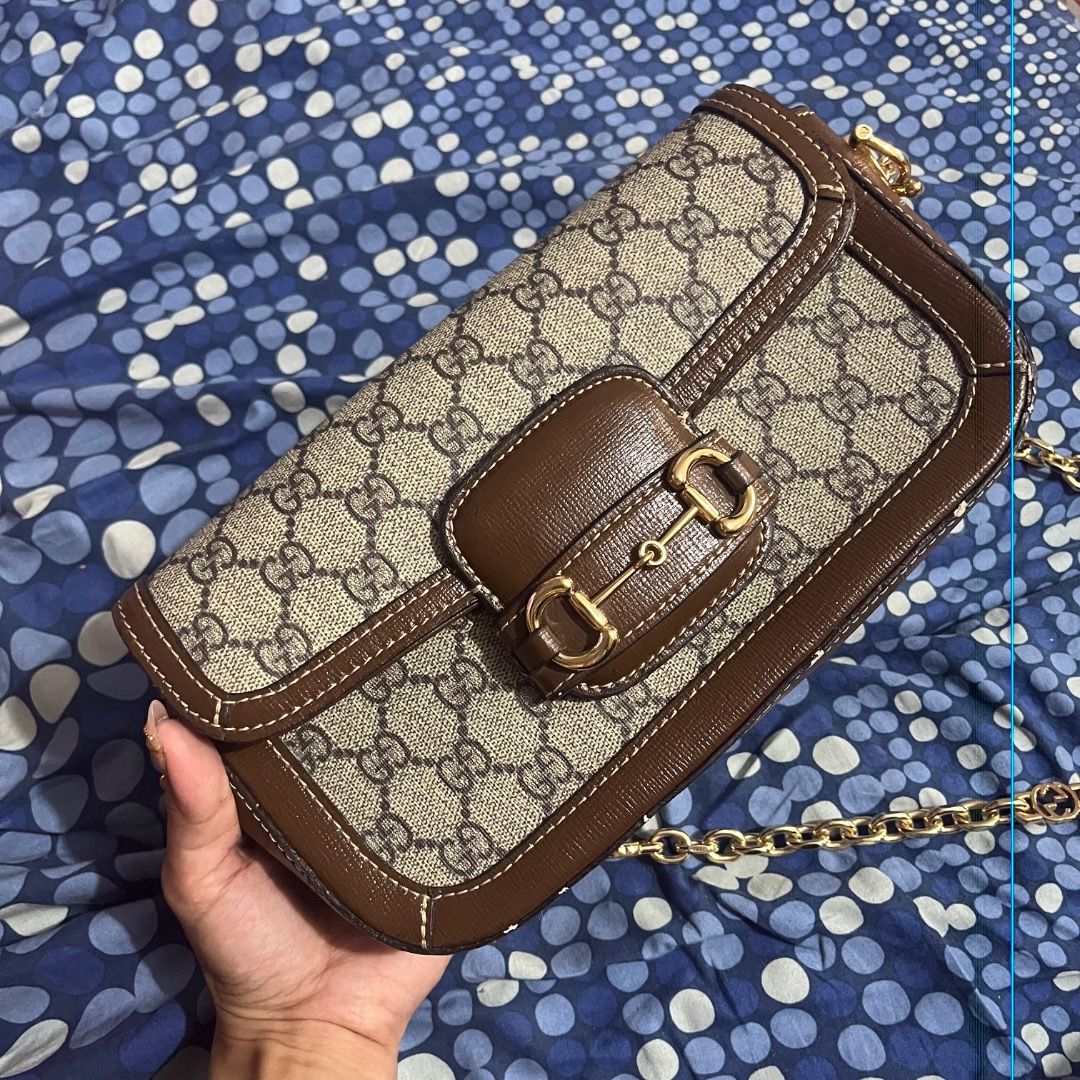 Gucci Ophidia GG Small Shoulder Bag (Category: Luxury Bags & Wallets) located in Caloocan City. Submitted by kathkoleksyon (Listing ID 1451425771, Image 1). Description: - Authentic Gucci shoulder bag - Classic GG monogram canvas - Brown leather trim - Gold-tone hardware - Iconic horsebit detail - Chain strap - Interior tag visible in photos - Versatile for day or night use.