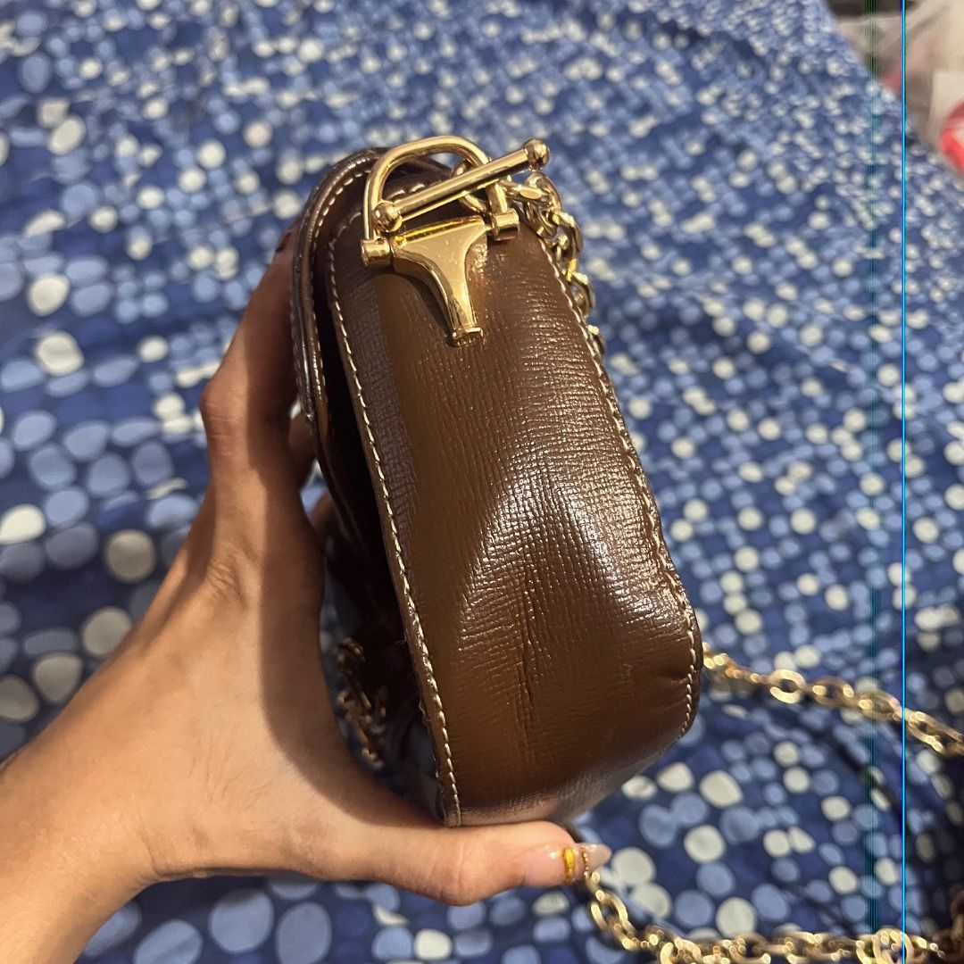 Gucci Ophidia GG Small Shoulder Bag (Category: Luxury Bags & Wallets) located in Caloocan City. Submitted by kathkoleksyon (Listing ID 1451425771, Image 3). Description: - Authentic Gucci shoulder bag - Classic GG monogram canvas - Brown leather trim - Gold-tone hardware - Iconic horsebit detail - Chain strap - Interior tag visible in photos - Versatile for day or night use.