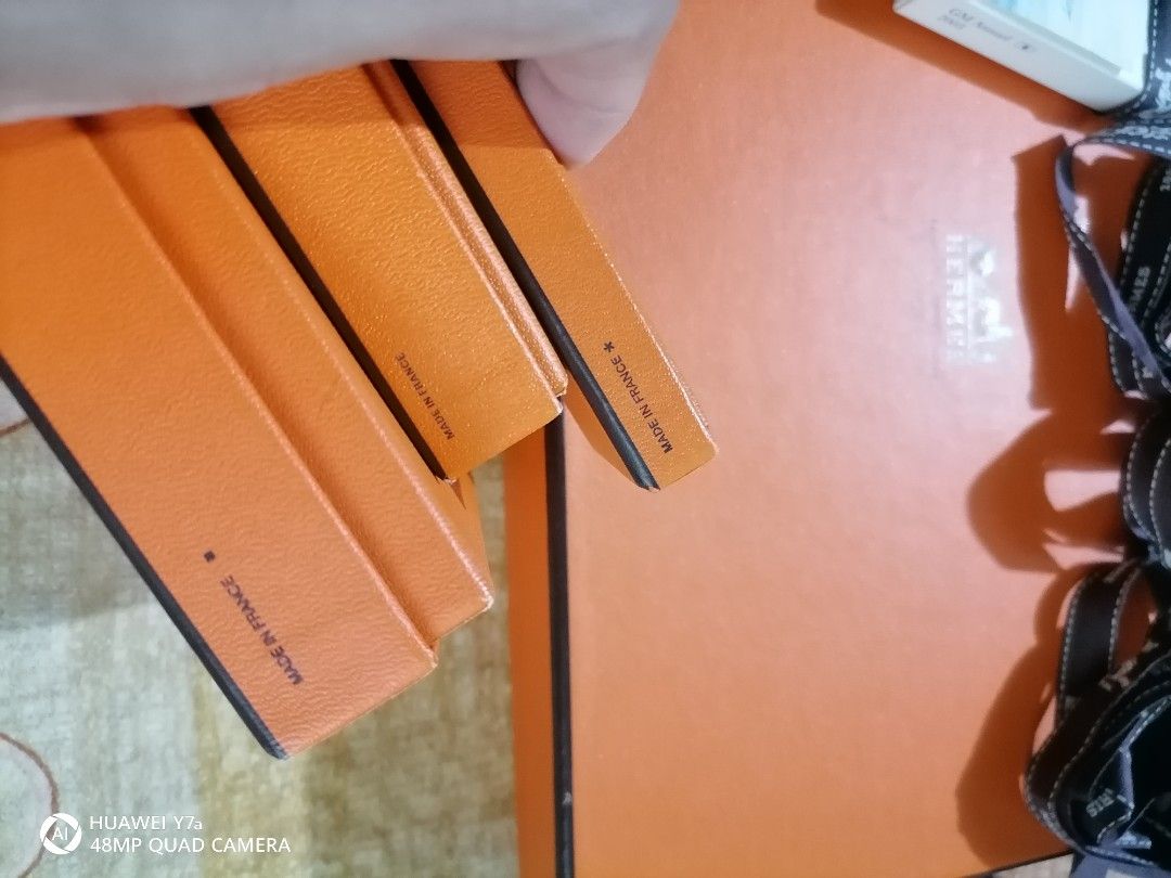 Hermes Gift Boxes and Shopping Bags (Category: Luxury Bags & Wallets) located in Naga. Submitted by mrwisethrifter (Listing ID 1451373251, Image 2). Description: - Authentic Hermes orange gift boxes and shopping bags bundle - Includes various sizes of boxes - Three paper shopping bags included - Some boxes come with original ribbons - Ideal for gifting or storing small luxury items.