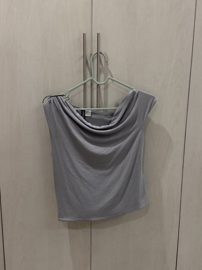 H&M Divided Grey Asymmetrical Drape Neck Top (Category: Sleeveless) located in Quezon City. Submitted by gogoop (Listing ID 1451438270, Image 2). Description: Size is medium MOP: Gcash Delivery: Grab/Lalamove.