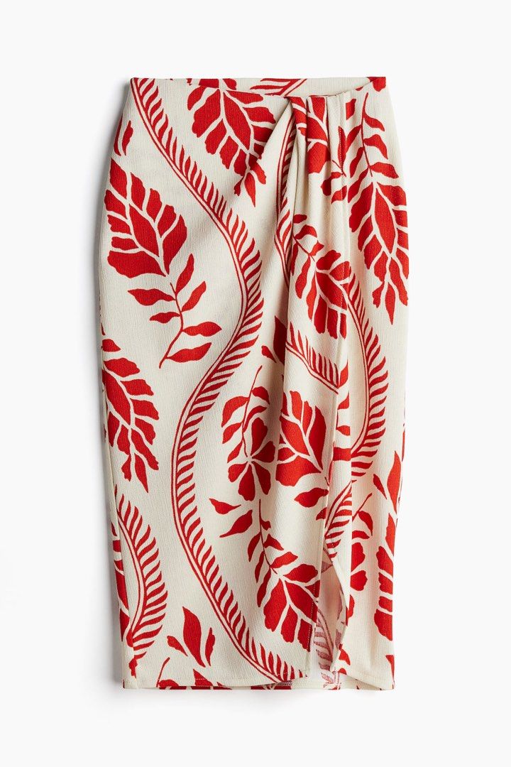 H&M Red Floral Print Ruched coords (Category: Sets & Coordinates) located in Pasuquin. Submitted by licashop.ph (Listing ID 1451369236, Image 3). Description: - H&M cream and red floral print coords - Features spaghetti straps and a square neckline - Ruched detailing on the bodice for a flattering fit - Side slit for ease of movement - Ideal for vacations or summer parties - Made from a light and breezy fabric.