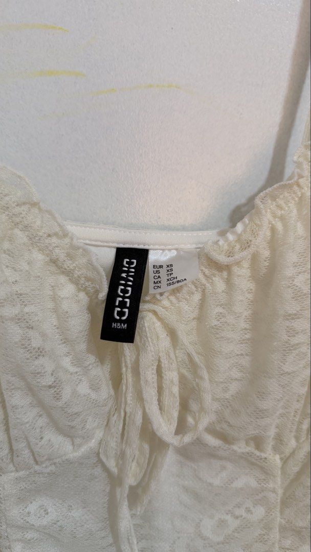 H&M White Lace Mini Fitted Dress (Category: Dresses) located in Rizal. Submitted by elleeestuff (Listing ID 1451398581, Image 3). Description: - Only used once - Cream color turned to slightly yellowish because it was stored in a cabinet - Can negotiate the price .