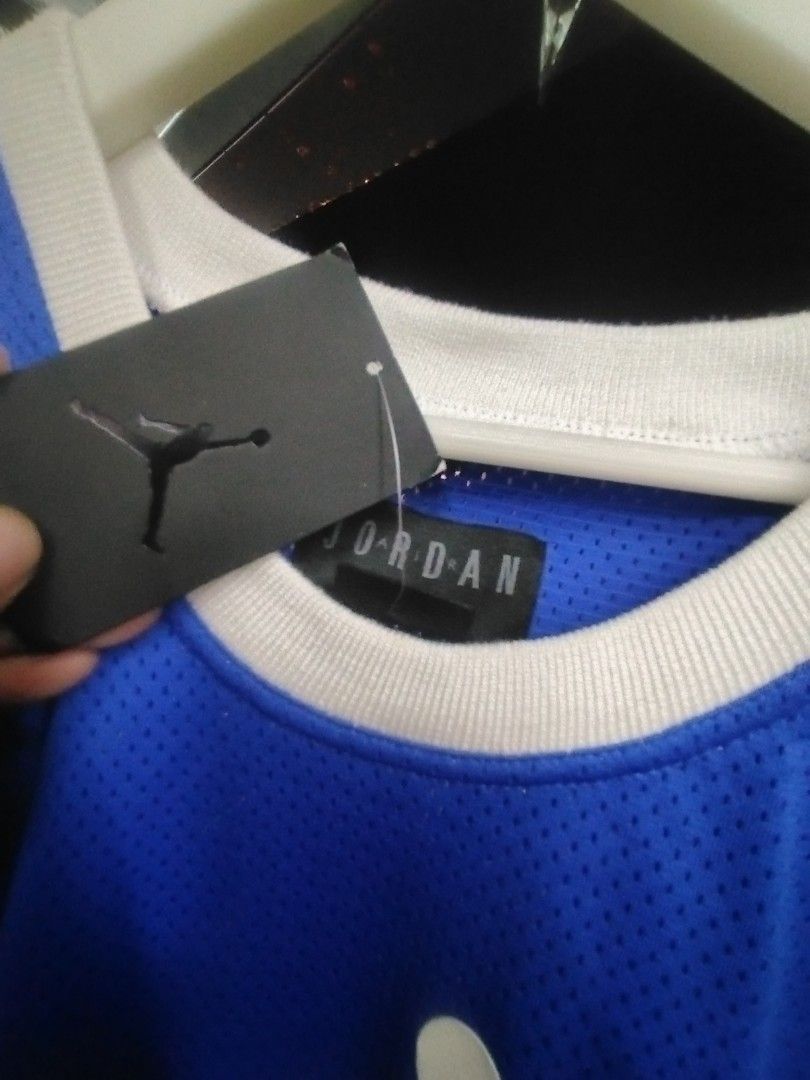 Jordan 23 Blue Basketball Jersey (Category: Activewear) located in Cabuyao City. Submitted by safemoon.8f1efa (Listing ID 1451515855, Image 3). Description: - Authentic Blue Jordan Basketball Jersey - Features iconic #23 on the back - Classic Jumpman logo on the front - Brand new with original tags attached - Made with breathable mesh material - Ideal for any Michael Jordan enthusiast.