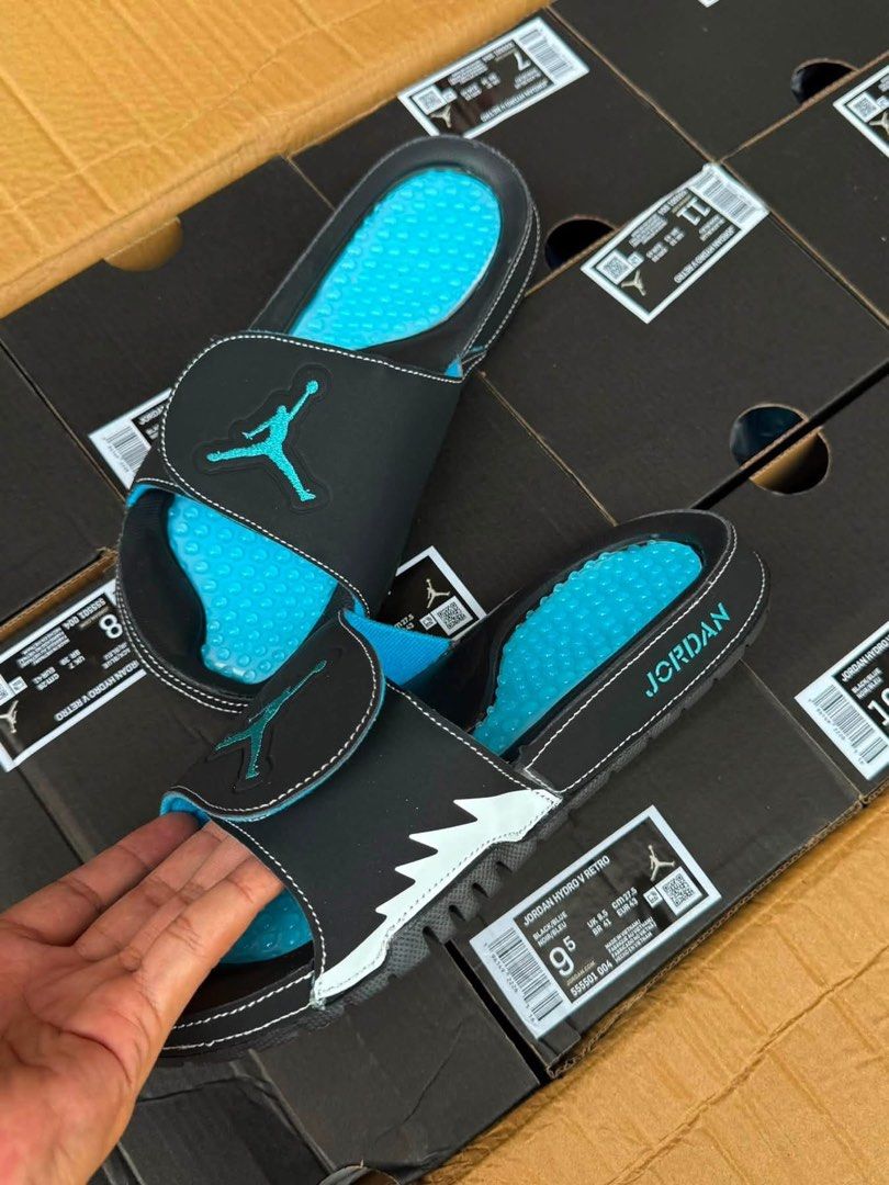 Jordan Hydro V Retro Slides Black Teal (Category: Slippers & Slides) located in Manila. Submitted by gfunkcap (Listing ID 1451430507, Image 2). Description: - Jordan Hydro V Retro slides in black and teal. - Features the iconic Jumpman logo. - Comfortable and stylish for everyday wear. - Includes original boxes. - Available in multiple sizes..
