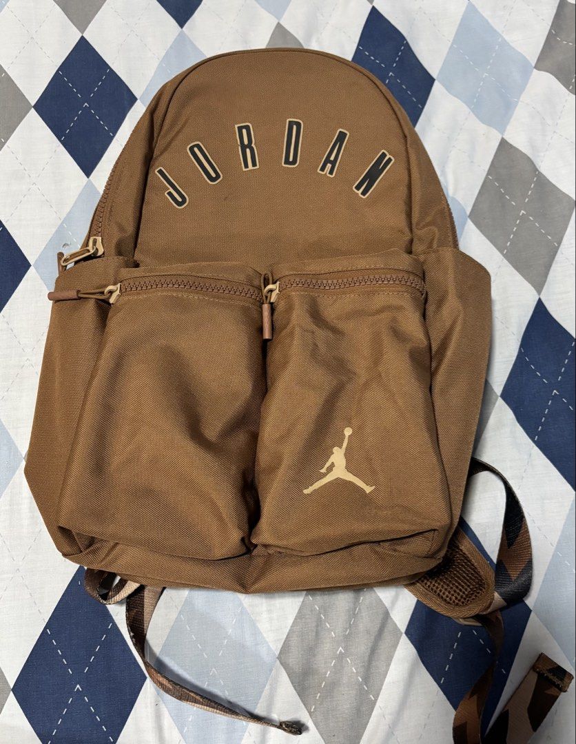 Jordan MVP Brown Backpack (Category: Backpacks) located in Antipolo. Submitted by sweetesyam (Listing ID 1451423461, Image 1). Description: - Brown Jordan backpack - Main compartment with inner sleeve for laptop - Two convenient front zip pockets - Padded straps for comfortable carrying - Ideal for everyday use, work or school.