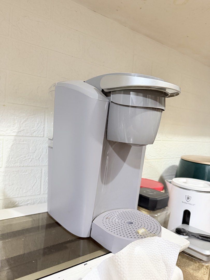 Keurig Grey Single Serve Coffee Maker with Reusable Filter (Category: Coffee Machines & Makers) located in Paranaque City. Submitted by hannahking36 (Listing ID 1451470076, Image 2). Description: 110V from US! No box. Not used. Grey single serve coffee maker. Works well. Comes with FREE reusable filter basket. Easy to use for your morning coffee. Drip tray is removable. Water reservoir is on the side. .