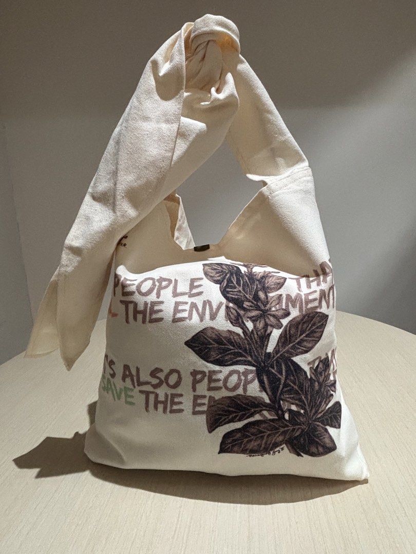 Knot Canvas Tote Bag Sampaguita Edition (Category: Tote Bags) located in Makati City. Submitted by PamsCorner (Listing ID 1451398166, Image 1). Description: - Canvas tote bag - Sampaguita Edition - Knotted handles at the top - Perfect for everyday use or as a statement piece - Advocacy Tote Bag - Spacious interior for essentials.