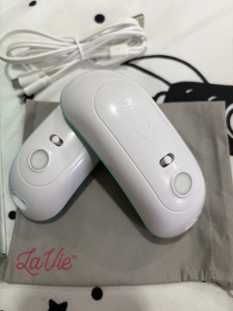 LaVie Warming Lactation Massage Pads (Category: Breastfeeding & Bottle Feeding) located in Manila. Submitted by randomwhatever_ (Listing ID 1451354176, Image 2). Description: For Sale: Lavie Warming Lactation Massage Pads Heat & Vibration Price: 2450php + shipping fee Very good used condition. No defects, with signs of usage. Complete with box, pouch, and original charger Location: Iloilo City Can meet up, and ship via J&T or LBC for COD. .
