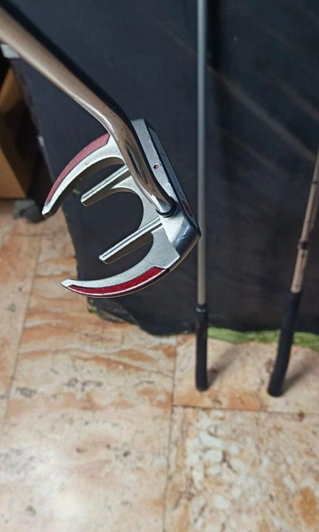 Left Handed ODYSSEY Sabertooth putter (Category: Golf) located in Manila. Submitted by meiyeon2 (Listing ID 1451344426, Image 2). Description: - Left-handed ODYSSEY Sabertooth putter - Unique Sabertooth design - Durable construction - Comfortable grip (shows some wear) - Ideal for left-handed golfers - AS IS .