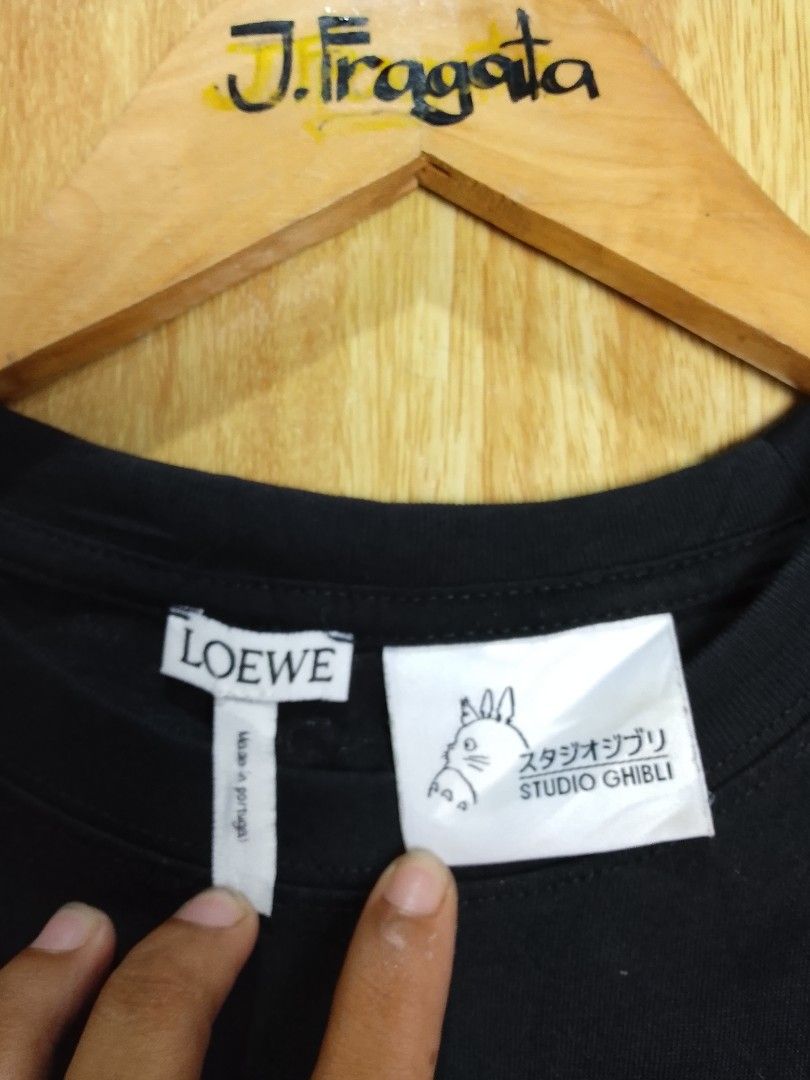 Loewe x Studio Ghibli (Category: Tshirts & Polo Shirts ) located in Santiago. Submitted by jonathanfragata21 (Listing ID 1451485860, Image 3). Description: Loewe x Studio Ghibli Width : 20.5 Length : 26.5 Size on tag : Small can fit Medium Color Rate 9.5/10 Excellent Condition No Flaws Price : 📥+Shipping Fee Location : Santiago City Isabela.