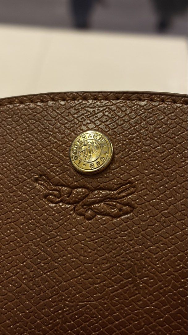 Longchamp | not auth3ntic (Category: Luxury Bags & Wallets) located in Manila. Submitted by hey.mdelo192 (Listing ID 1451394755, Image 3). Description: ₱1,000 (NEGOTIABLE) - size MEDIUM - color BLACK - nylon outside & leather inside - no issue aside from gold hardware is a bit fading (see other photos).