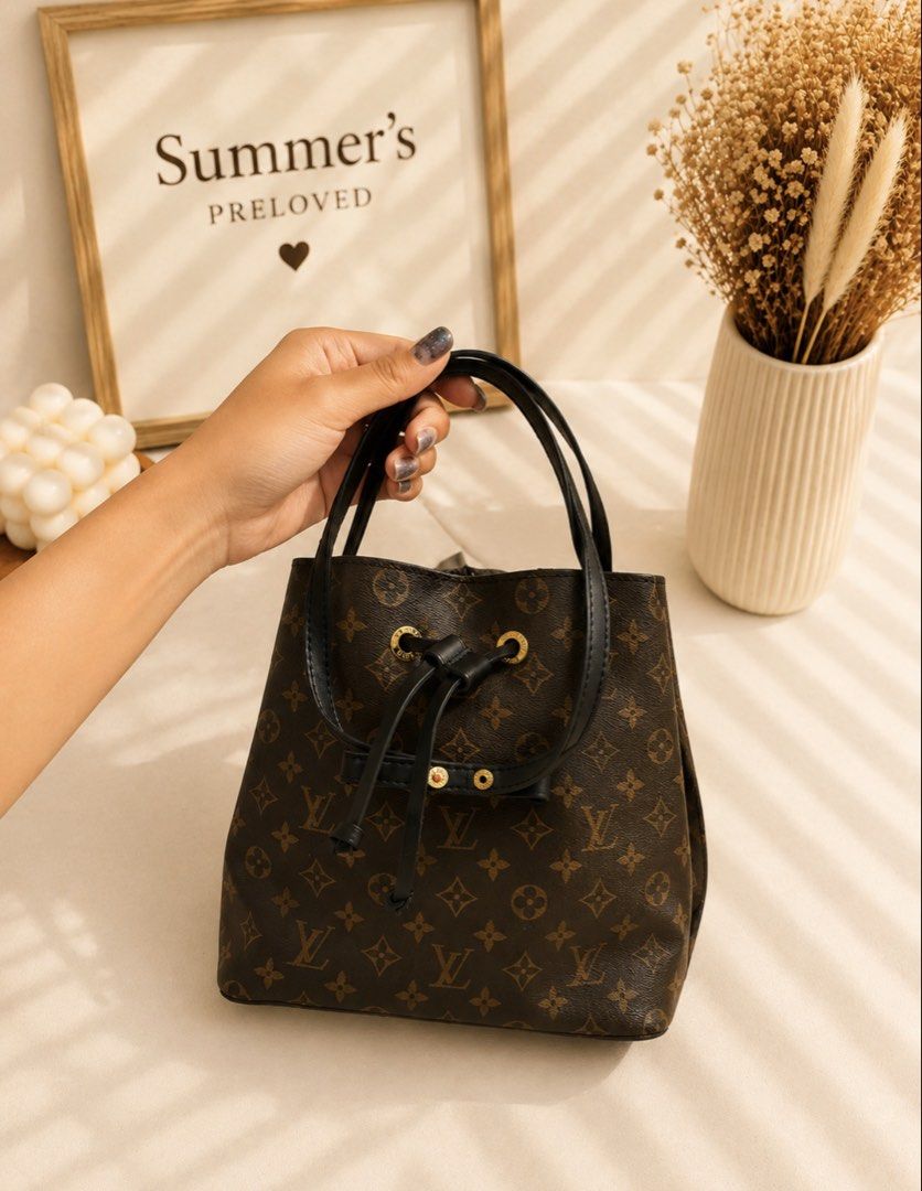 Louis Vuitton Bucket Bag (Category: Luxury Bags & Wallets) located in Taguig. Submitted by summers.preloved (Listing ID 1451346513, Image 2). Description: - Iconic print - Secure Drawstring Closure - Versatile Wear: Shoulder or Crossbody - Interior Zippered Pocket - Elegant Gold Hardware Details - Ideal Everyday Bag.