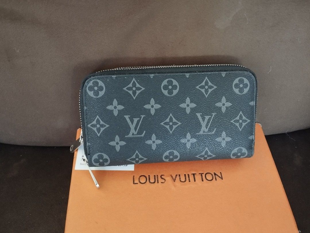Louis Vuitton Monogram Double Zip Wallet (Category: Luxury Bags & Wallets) located in Manila. Submitted by liveeagle-c6d8 (Listing ID 1451374211, Image 2). Description: - Authentic Louis Vuitton wallet - Classic monogram pattern - Two zippered compartments - Includes original Louis Vuitton box - Ideal for organizing essentials.