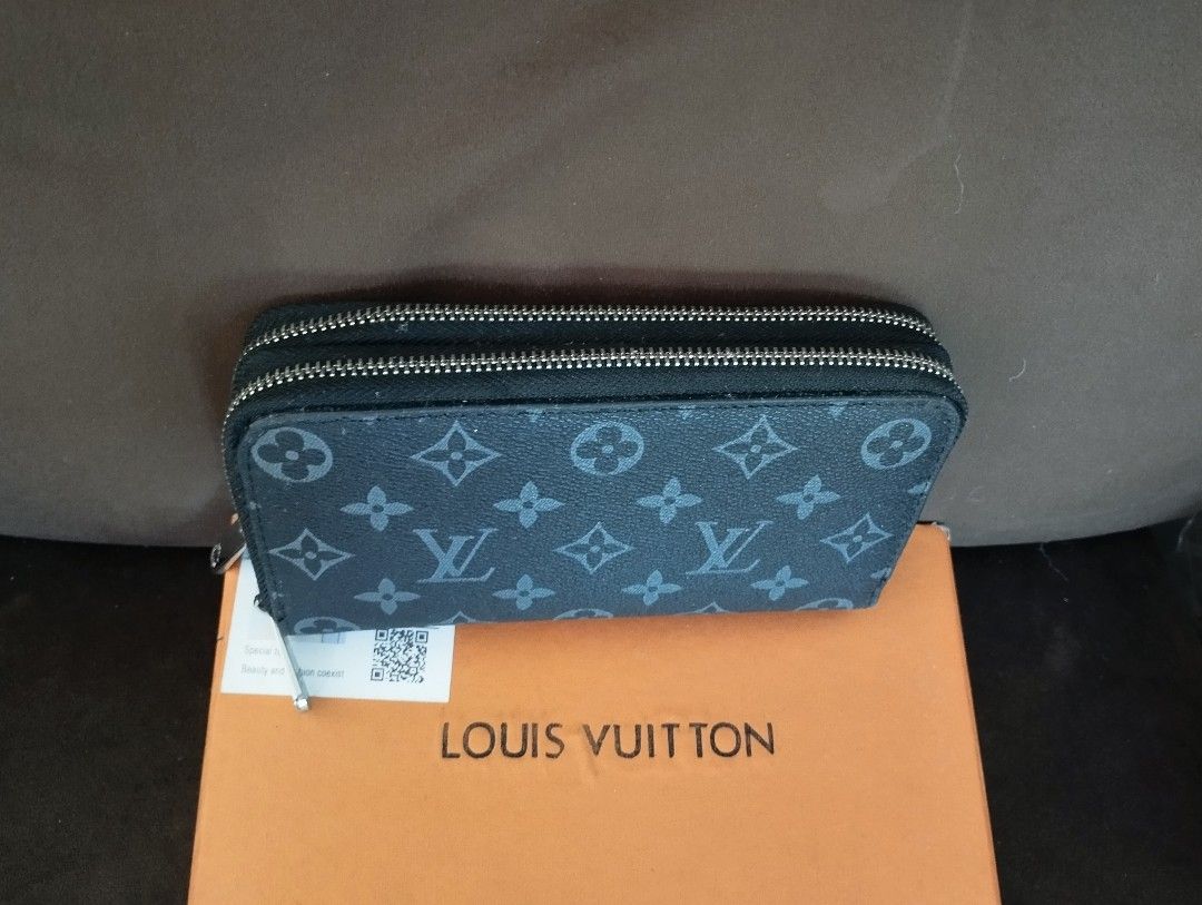 Louis Vuitton Monogram Double Zip Wallet (Category: Luxury Bags & Wallets) located in Manila. Submitted by liveeagle-c6d8 (Listing ID 1451374211, Image 1). Description: - Authentic Louis Vuitton wallet - Classic monogram pattern - Two zippered compartments - Includes original Louis Vuitton box - Ideal for organizing essentials.