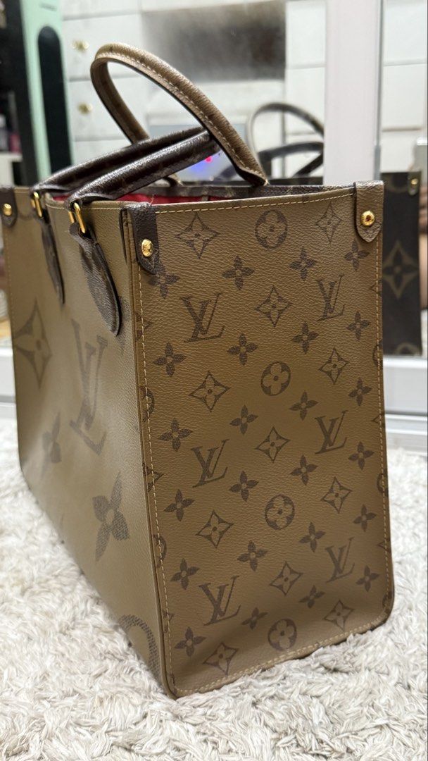 Louis Vuitton OnTheGo GM Monogram Canvas (Category: Luxury Bags & Wallets) located in Binangonan. Submitted by thingsbydes (Listing ID 1451434168, Image 3). Description: AUTHENTIC. 90% like new condition. 41 x 34 x 19 cm (Length x Height x Width) Monogram and Monogram Reverse coated canvas and trim Textile lining Gold-color hardware Flat zipped inside pocket Double inside pocket 2 long leather shoulder straps (drop: 28 cm) Fits: 13-inch laptop, s