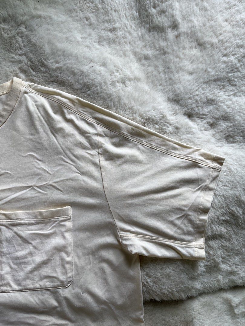 LULULEMON - Cream Pocket T-Shirt (Category: Tshirts & Polo Shirts ) located in Naga. Submitted by fresh_fit (Listing ID 1451471568, Image 3). Description: LULULEMON - Cream Pocket T-Shirt - Cream colored t-shirt - Features a chest pocket - Short sleeves and crew neck - Simple, classic design - Comfortable for everyday casual wear - Measurements available in the first photo Size: M on tag (can fit Medium to Large) Width: 21 inches Length: 27 inche