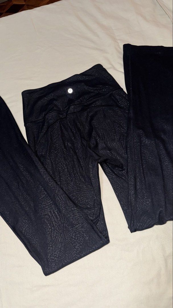 Lululemon Align High-Rise Flare Leggings Black Pattern Size 4 (Category: Activewear) located in Las Pinas. Submitted by mbisl (Listing ID 1451476763, Image 1). Description: Lululemon Align leggings in a black textured pattern. High-rise waist with a flare leg opening. Comfortable and stretchy material. Great for workouts or casual wear. Size 4. Check photos for details..