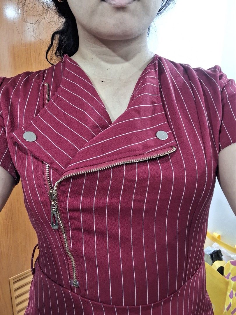 Maroon Striped Zipper Dress (Category: Dresses) located in Antipolo. Submitted by blueverly (Listing ID 1451485924, Image 1). Description: - Fits medium size - Stylish maroon dress with subtle white pinstripes. - Unique asymmetrical zipper detail on the front. - Flattering belted waist. - Knee-length skirt. - Ideal for both casual outings and work attire..