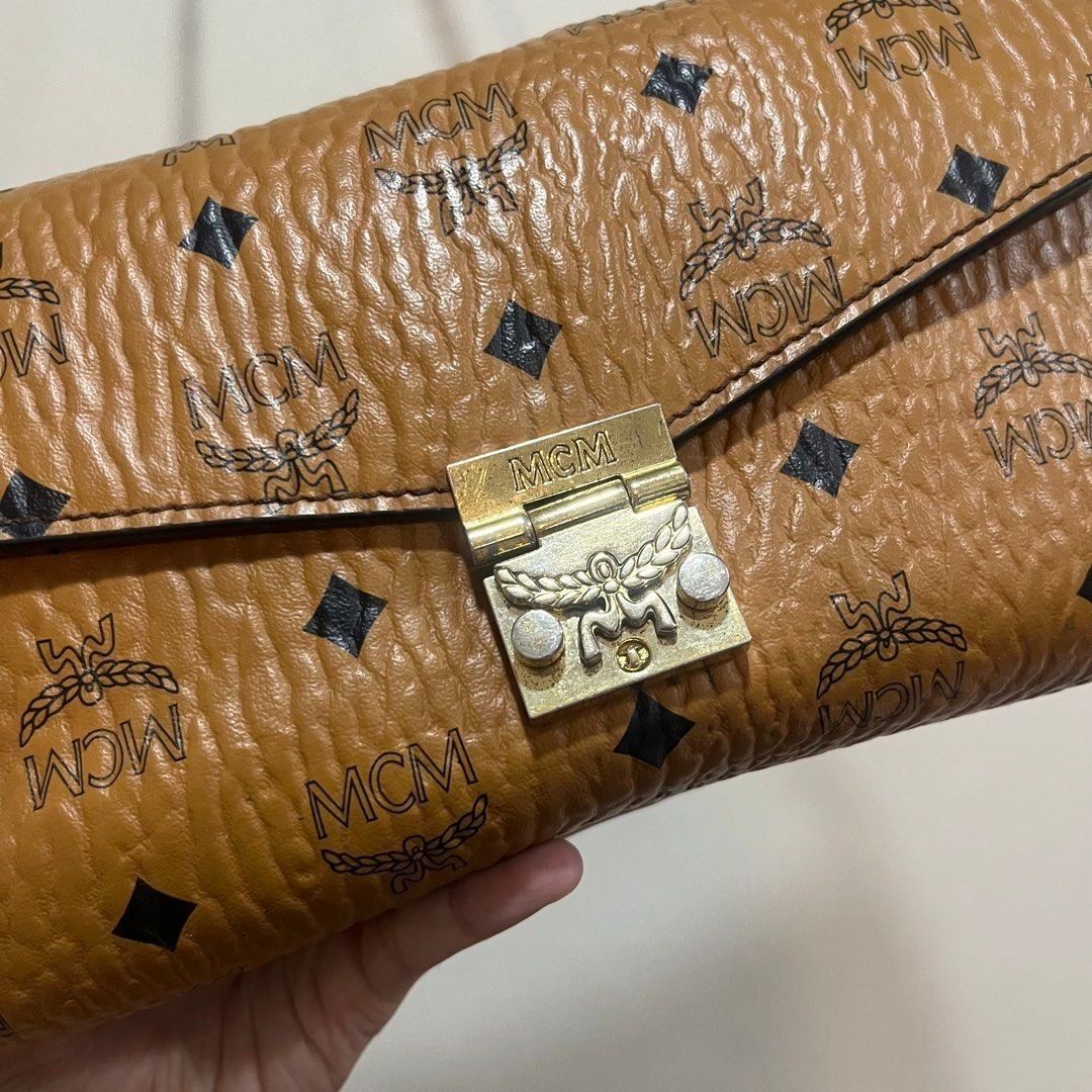 MCM Crossbody Bag (Category: Cross-body Bags) located in Taytay. Submitted by second_couturecache (Listing ID 1451432232, Image 3). Description: Off/Legit, kayo nalang po magcheck. May sign of use sa body and flaws sa hardware! Yung sling replaced! Selling for reasonable price so manage your expectation! Bawal sa maseselan! First to pay basis and payment first. Other Delivery option shouldered by buyer: Lalamove or J&T. Location: Taytay, Rizal.