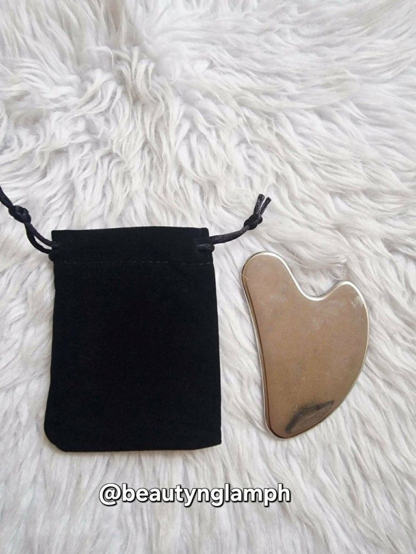 Metallic Gua Sha (Category: Face Care) located in Quezon City. Submitted by floreskari78555 (Listing ID 1451362358, Image 2). Description: Metallic Gua Sha ✨ ​Upgrade your skincare routine with this premium, shatterproof metallic Gua Sha. It provides a natural cooling effect and is perfectly shaped to massage and contour your face, neck, and body. ​Benefits: ​✔️ Depuffs: Cooling metal instantly reduces facial puffiness. ​✔️ Sculpts: Defines your 