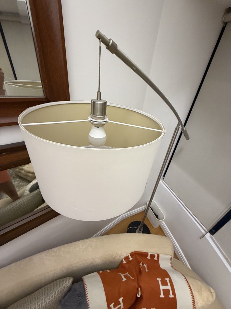 Modern Arc deco Floor Lamp with White Drum Shade (Category: Lighting) located in Makati City. Submitted by pikotins (Listing ID 1451390682, Image 3). Description: - Adjustable arc floor lamp(made in Europe imported) - White drum shade - Brushed nickel metal finish - Ideal for reading or ambient lighting - Works well Specs: - Height: ~6ft - Base: Heavy oval black marble base, stable - Pole: Brushed nickel, arc design - Shade: White fabric drum sha