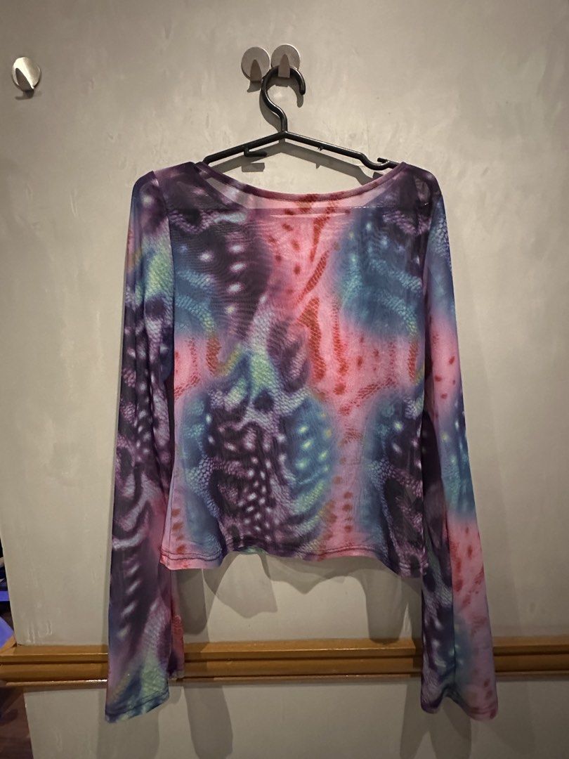 MUSERA Purple Mesh Long Sleeve Top & Shorts Set (Category: Sets or Coordinates) located in Quezon City. Submitted by shopalmostfriday (Listing ID 1451334425, Image 3). Description: - Brand: MUSERA - Style: Mesh Set - Design: Vibrant tie-dye print (purple, pink, blue) - Top: Long-sleeved crop style - Bottoms: Comfortable shorts - Size: Large on tag but fits best Medium frames - Perfect for: concerts, music festivals and party - worn once only.