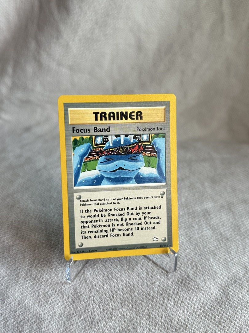 Neo genesis - Focus Band 86/111 Tomokazu Komiya (Category: Toys & Games) located in Kuala Lumpur. Submitted by decemberj (Listing ID 1451491079, Image 1). Description: - Pokemon TCG Focus Band Trainer Card - Perfect addition to your komiya collection.