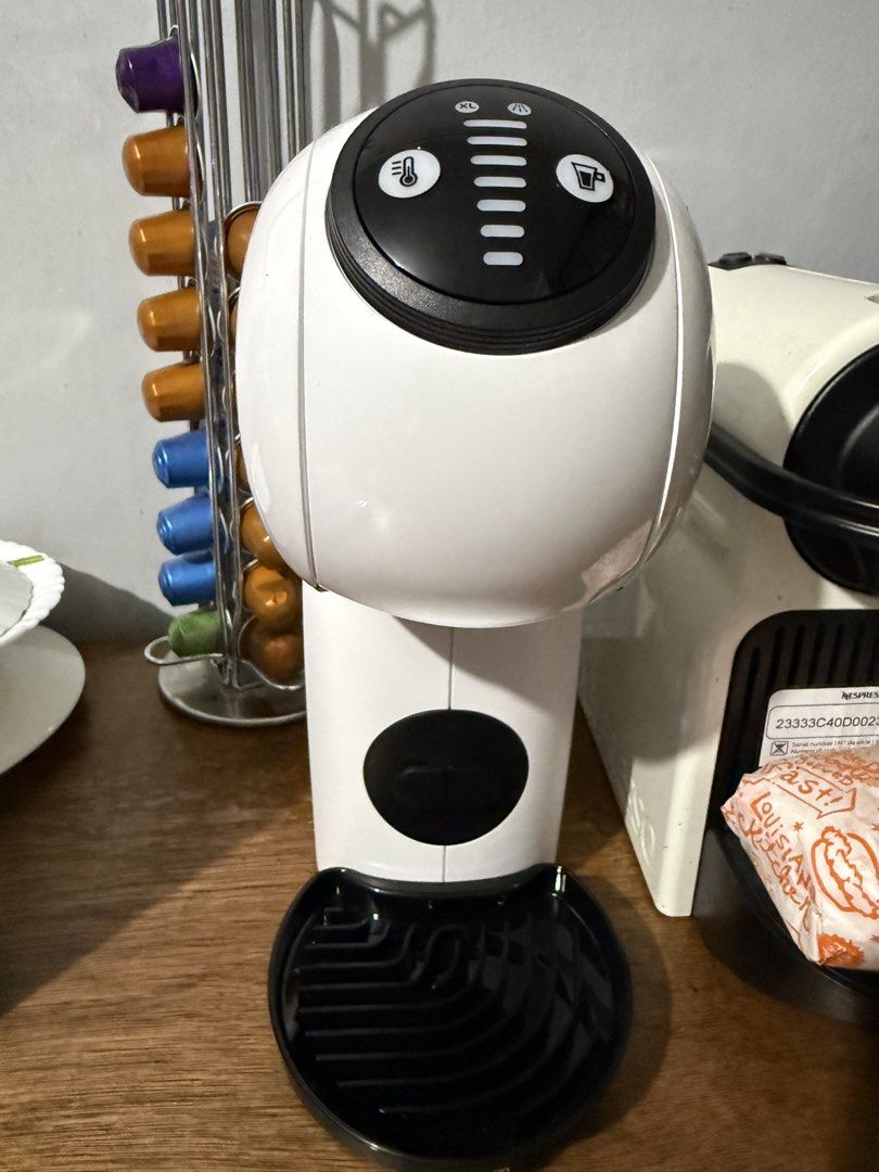 Nescafé Dolce Gusto Genio S Coffee Machine (Category: Coffee Machines & Makers) located in Cavite. Submitted by garageprimesales (Listing ID 1451337909, Image 2). Description: - Nescafé Dolce Gusto Genio S Coffee Machine - Auto stop function for perfect brewing - Eco mode for energy saving - Versatile: Makes both hot and cold beverages - Play & Select feature for easy operation - Powerful 15 bar maximum pressure for rich coffee - Enjoy delicious 