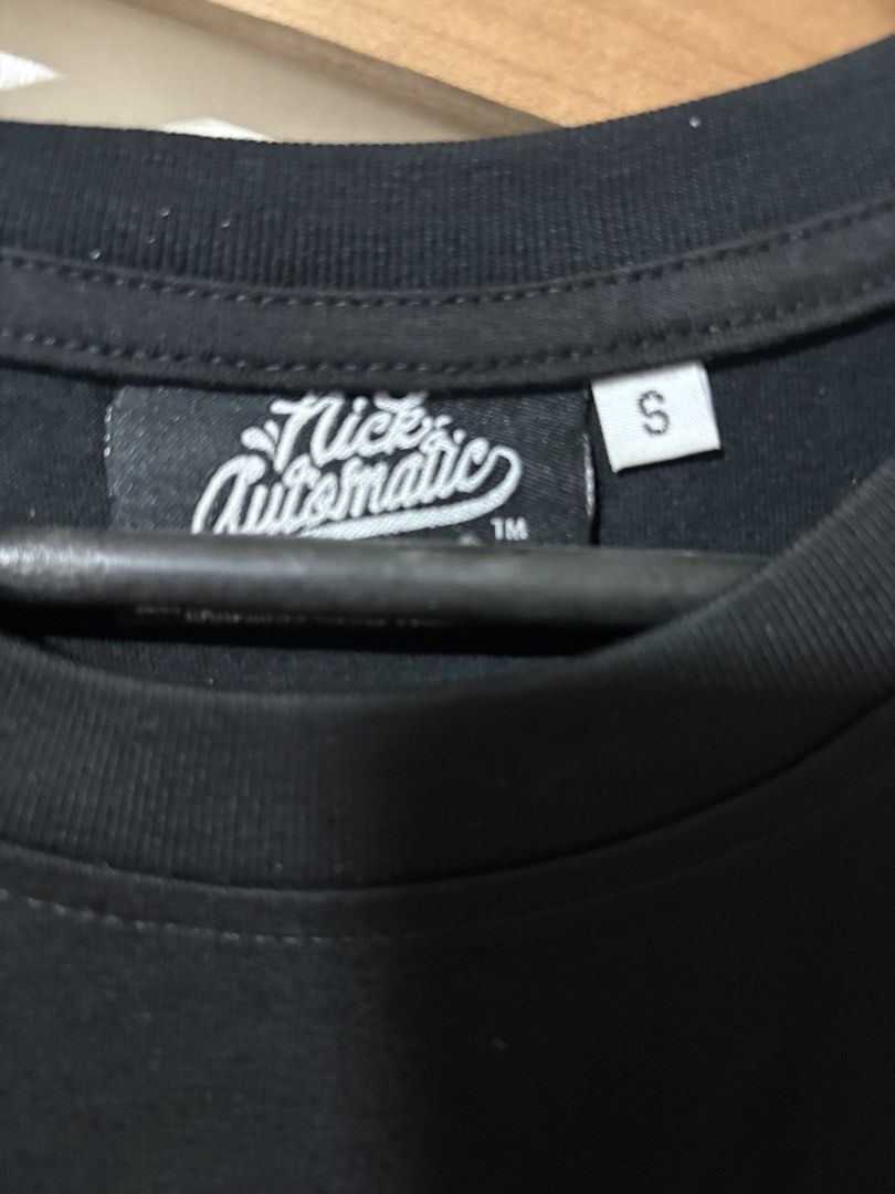 Nick Automatic Graphic T-Shirt Size S (Category: Tshirts & Polo Shirts ) located in Manila. Submitted by eyakb (Listing ID 1451346218, Image 3). Description: - Black Nick Automatic graphic t-shirt - Features a cool robot/alien design on the front - Nick Automatic logo in white on the back - Size: Small (S) - Ideal for everyday casual wear.