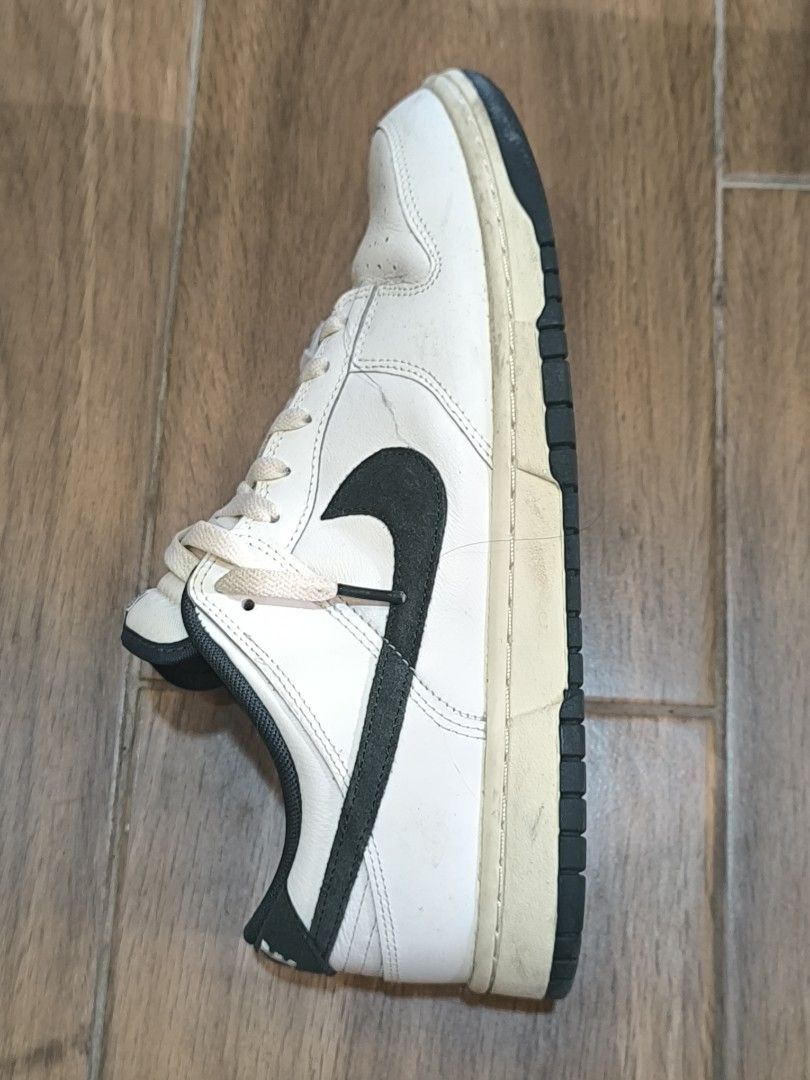 Nike Dunk Low White Black 1972 Athletic Dept. (Category: Sneakers) located in Manila. Submitted by tippytottie (Listing ID 1451420829, Image 1). Description: - Original - Classic white Nike Dunks - Black swoosh detail - Features 1972 Athletic Dept. logo on insole - Laces are a bit off-white - Soles show some dirt and wear.