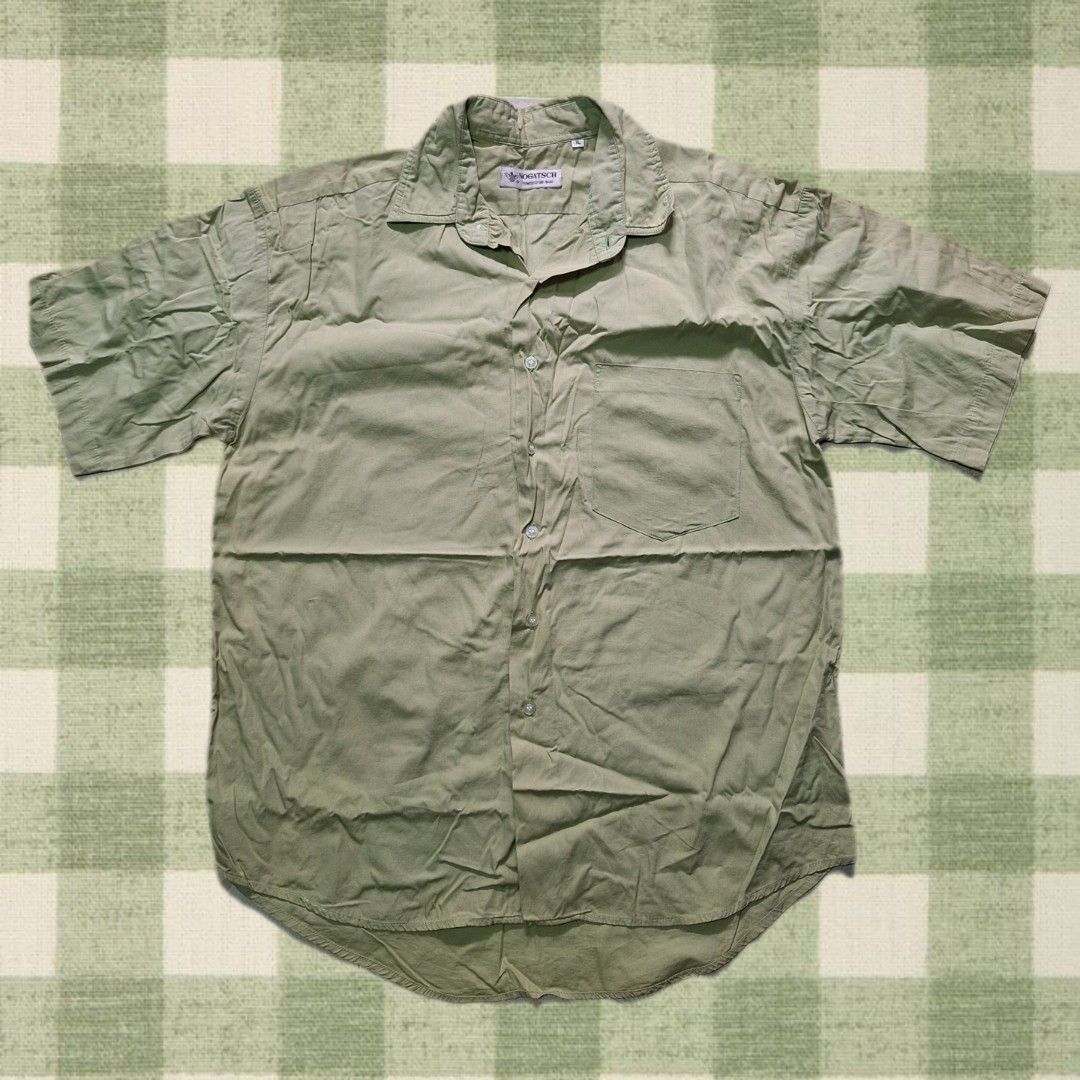 NOGATSCH Short Sleeve Button Up Shirt (Category: Tshirts & Polo Shirts ) located in Rizal. Submitted by caramelmics (Listing ID 1443808842, Image 1). Description: Light green short sleeve shirt Size: XL NO ISSUE DM me for questions! MOP: GCash or Maribank MOD: J&T Tags: green shirt, short sleeve shirt, light green top, casual shirt, plain shirt, size XL shirt, unisex shirt, basic shirt, preloved shirt.