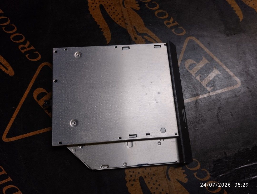 Panasonic Slim Internal CD/DVD Drive UJ-260 (Category: Hard Disks & Thumbdrives) located in Manila. Submitted by acgprinting08798 (Listing ID 1451513550, Image 2). Description: - Panasonic UJ-260 internal slim CD/DVD drive - Removed from a working laptop - Tested and confirmed to be in working condition - Ideal for replacing a broken drive or upgrading your laptop - SATA interface.
