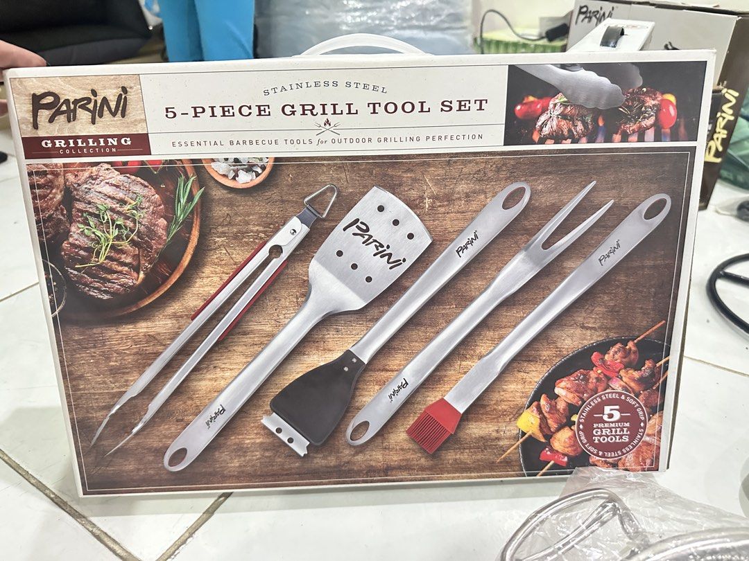 Parini Stainless Steel 5-Piece Grill Tool Set (Category: Cookware & Accessories) located in Quezon City. Submitted by faststone.ba186f (Listing ID 1451444305, Image 1). Description: - Parini 5-piece stainless steel grill tool set - Includes: tongs, spatula, fork, and basting brush - Essential for outdoor grilling perfection - Ergonomic soft grip handles for comfortable use - Hanging holes on each tool for convenient storage - Ideal for your next 