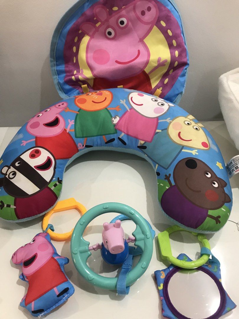 Peppa Pig tummy time activity pillow (Category: Infant Playtime) located in Quezon City. Submitted by shop_outlet (Listing ID 1451430924, Image 1). Description: - Peppa Pig themed activity arch for babies - Features beloved Peppa and friends characters - Comes with a baby-safe mirror - Includes various hanging toys for engagement - Ideal for tummy time play - Keeps babies entertained on the go - great for tummy time .