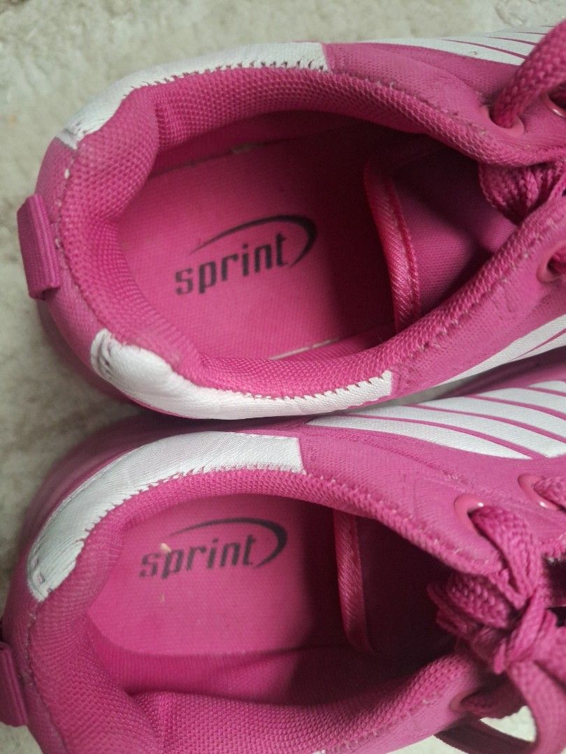 Pink Sprint Sneakers with White Stripes (Category: Sneakers) located in Antipolo. Submitted by blueverly (Listing ID 1451325299, Image 2). Description: - fits SIZE 7 (says size 8 on shoes) - Zumba Shoes - Barbie Pink with white stripes on the sides - Secure lace-up closure - Durable soles with excellent grip - Ideal for running or everyday casual wear.